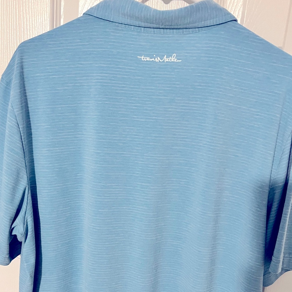 Travis Mathew golf polo.